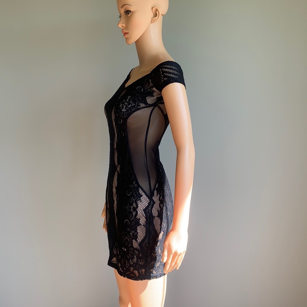 Dress with sheer accents